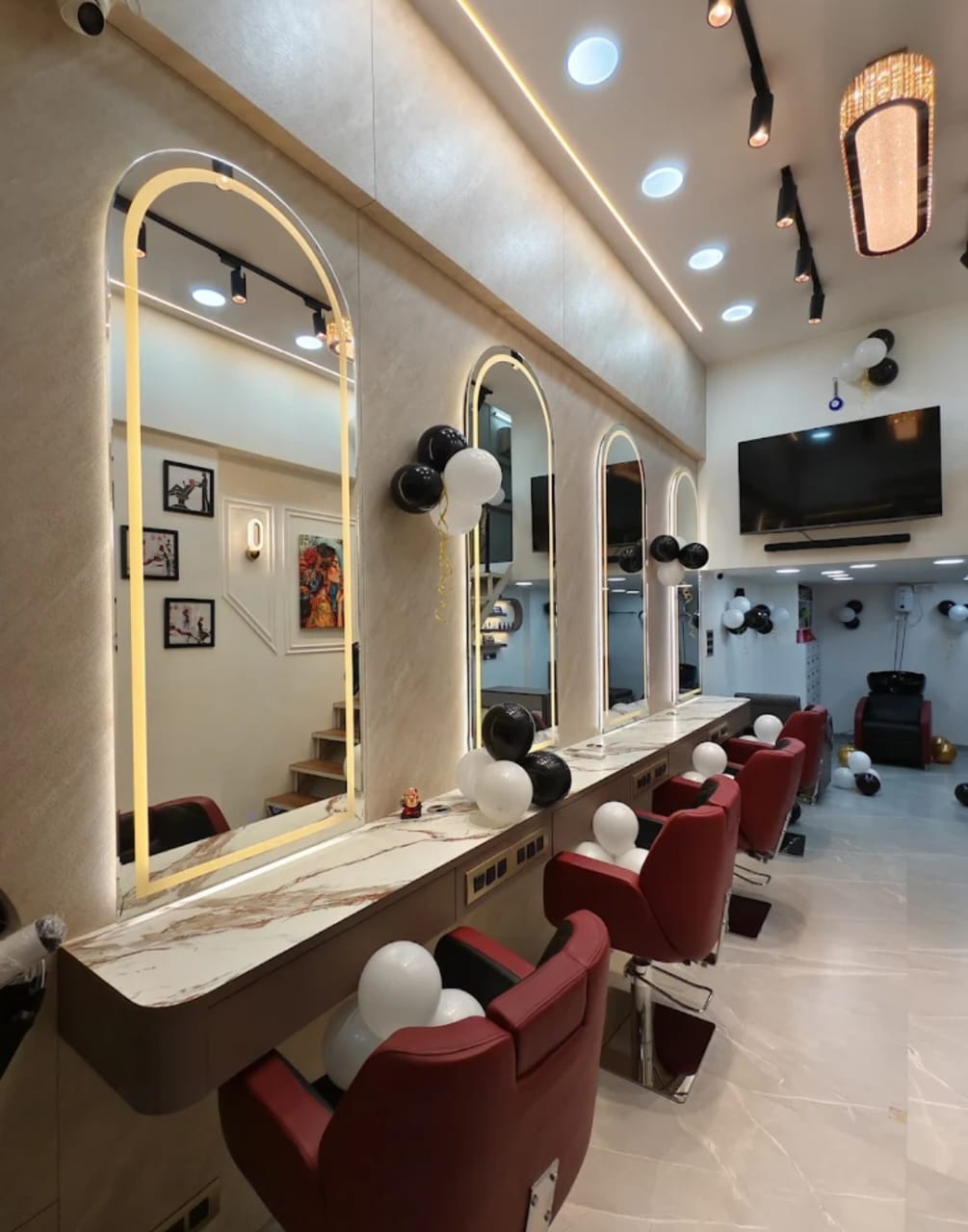 Luxury styling stations with gold-framed mirrors